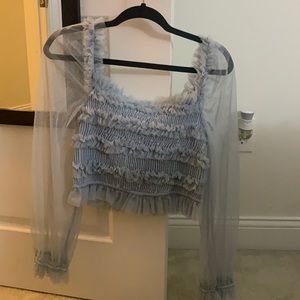 Blue ruffle top